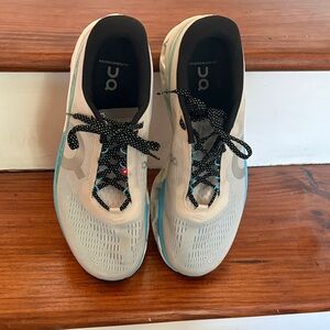 On Running Athletic Shoes in White and Blue